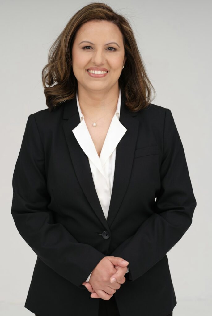 Practice Owner Dr. Nisha Bhattarai providing expert cosmetic and family dentistry at Legacy Dental of Denton.